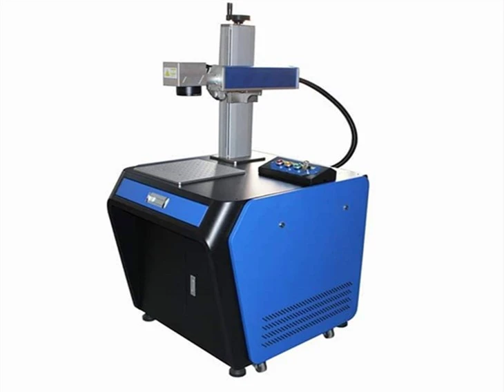 Laserkaiverruskone metalliin